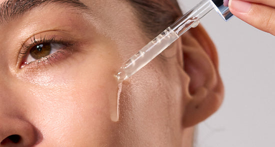 model dispensing serum onto face