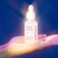 Breakout Clearing Liquid Peel bottle on hand