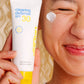 Model with Clearing Defense SPF 30 swatch on face